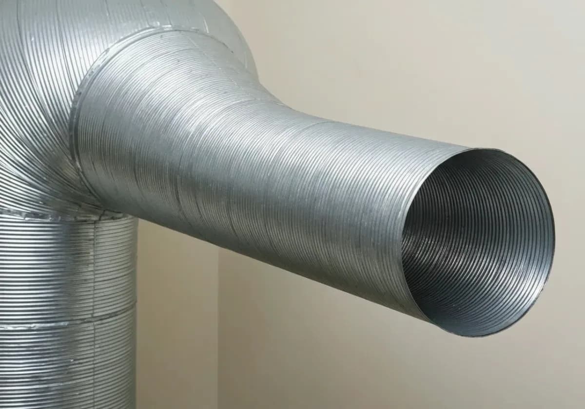 After — dryer vent cleaning: A lint-choked vent run opened up again for cooler, quicker, safer drying.